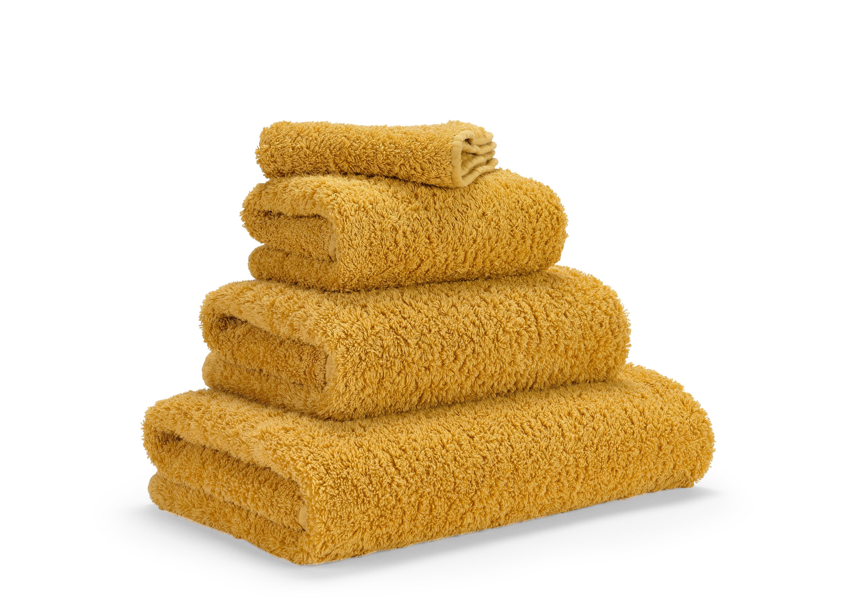 Premium-Handtuch-Set aus feinster Giza 70 Baumwolle in Gold – luxuriöses Badtextil von Tiamont, passend zu edlen Badmöbeln und stilvollen Interieurs.