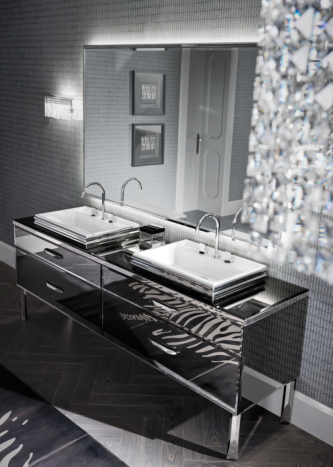 Hilton Shine with smoked-mirror fronts, steel profiles and twin basins