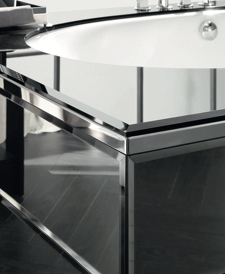 Hilton Shine: stepped polished steel surround around the mineral-marble basin