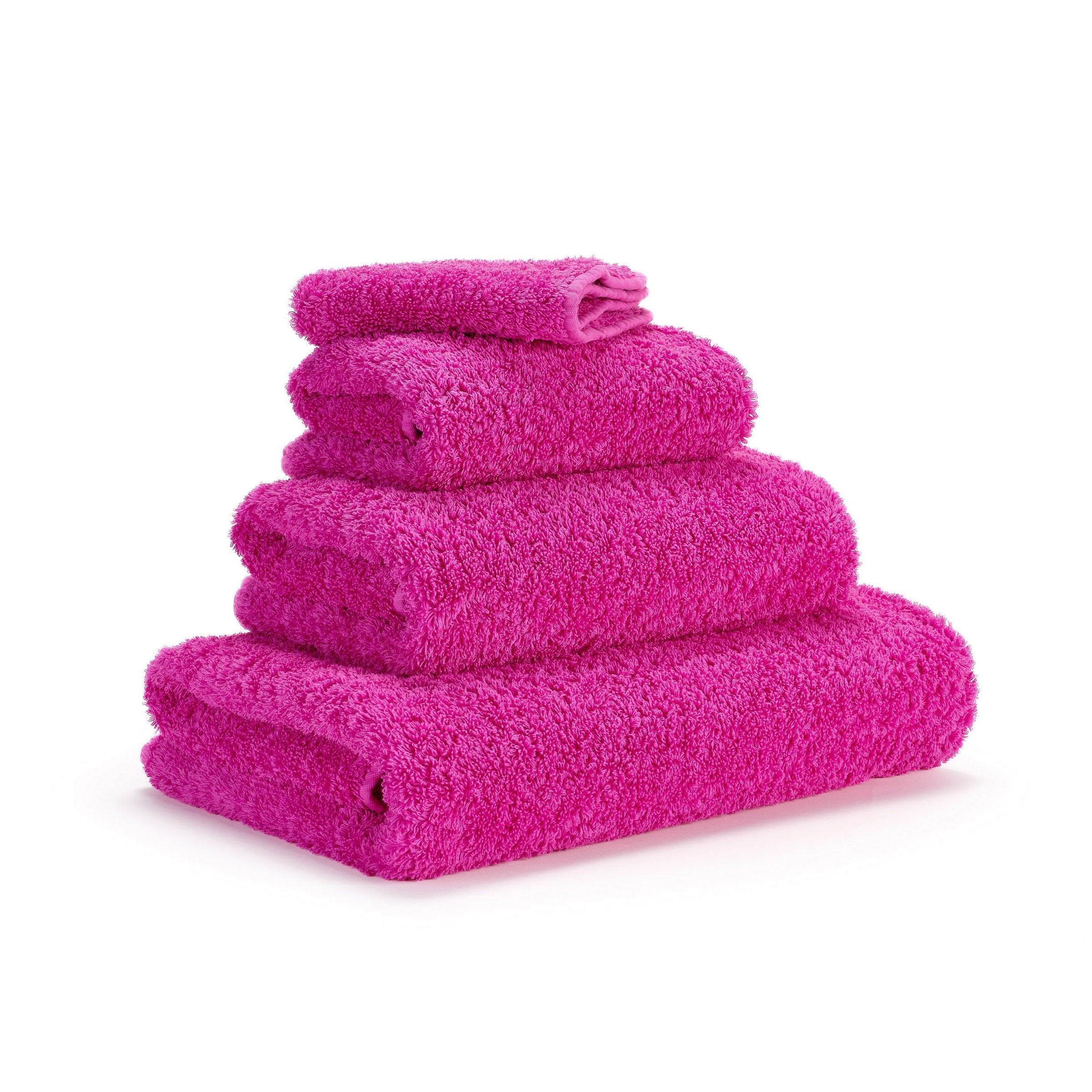 Super Pile Luxus Handtücher in Happy Pink 570 aus Giza 70 Baumwolle – seitlich gestapelt